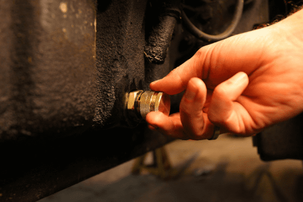 oil drain valve hand